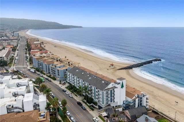 bird's eye view with a view of the beach and a water view