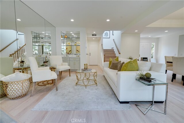 living room with light hardwood / wood-style floors