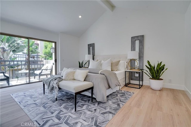 bedroom with high vaulted ceiling, beamed ceiling, light wood-style flooring, baseboards, and access to exterior