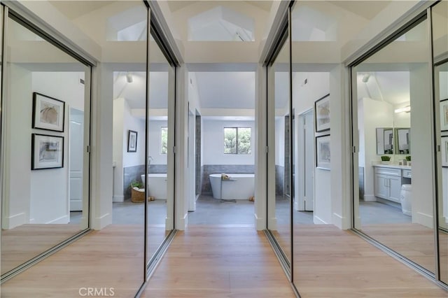 hall featuring light wood-style floors