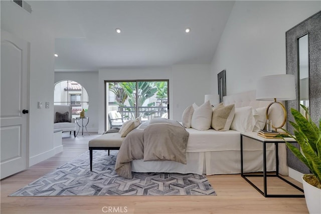 bedroom featuring wood finished floors, baseboards, access to exterior, visible vents, and recessed lighting