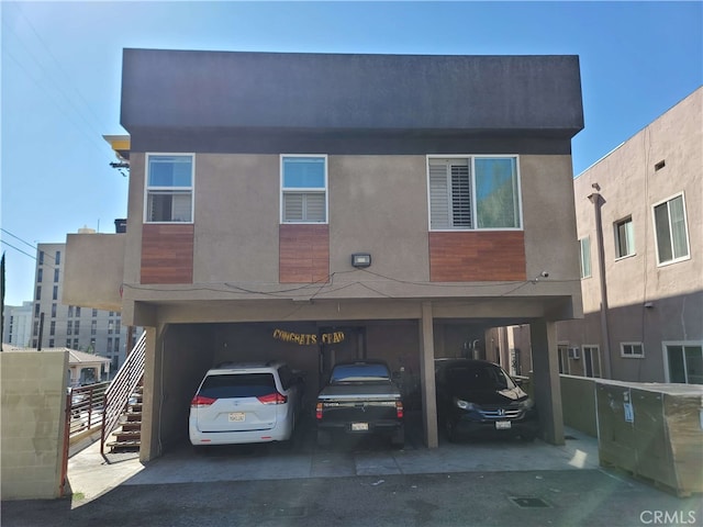view of front of house featuring stucco siding