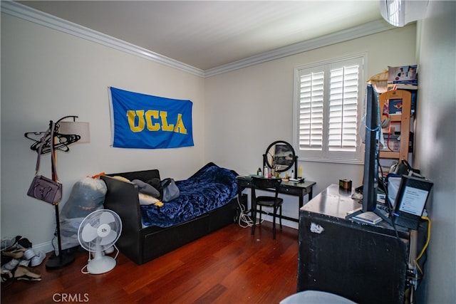 bedroom with crown molding and dark hardwood / wood-style floors