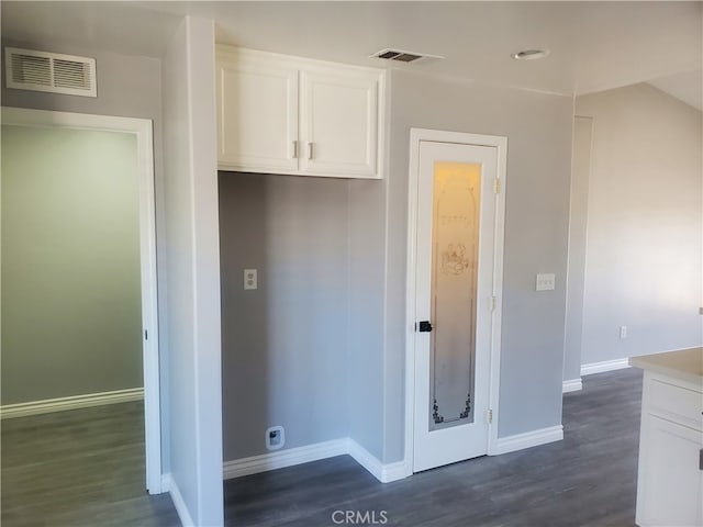 interior space with dark hardwood / wood-style flooring