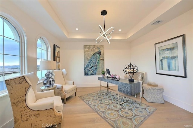 20487 Gartel Dr, Walnut, CA 91789 - office featuring wood finished floors, a tray ceiling, a chandelier, baseboards, and recessed lighting
