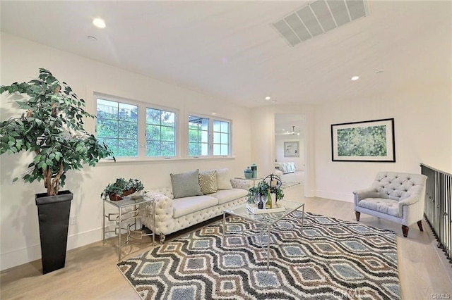 20487 Gartel Dr, Walnut, CA 91789 - living room with wood finished floors, baseboards, and recessed lighting