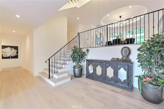 20487 Gartel Dr, Walnut, CA 91789 - stairway featuring wood finished floors, recessed lighting, and baseboards