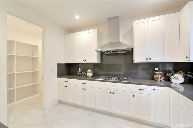 20487 Gartel Dr, Walnut, CA 91789 - kitchen featuring wall chimney exhaust hood, gas cooktop, dark countertops, white cabinetry, and recessed lighting