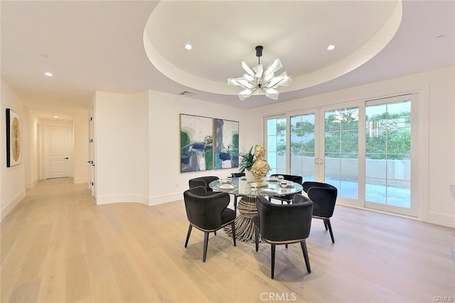 20487 Gartel Dr, Walnut, CA 91789 - dining area featuring light wood-type flooring, baseboards, recessed lighting, a raised ceiling, and a chandelier