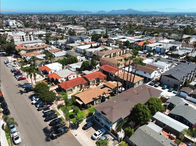 drone / aerial view featuring a mountain view