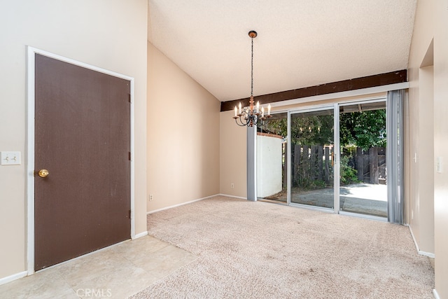 unfurnished room with light carpet, a notable chandelier, lofted ceiling, and a textured ceiling