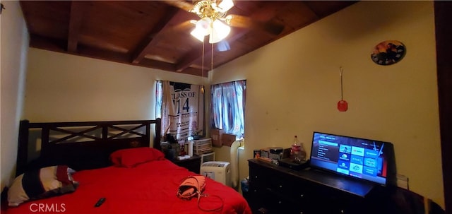 bedroom with lofted ceiling, wood ceiling, and ceiling fan