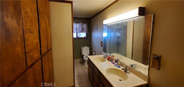 bathroom with vanity, walk in shower, tile patterned floors, and toilet