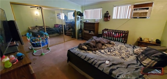 carpeted bedroom featuring a closet