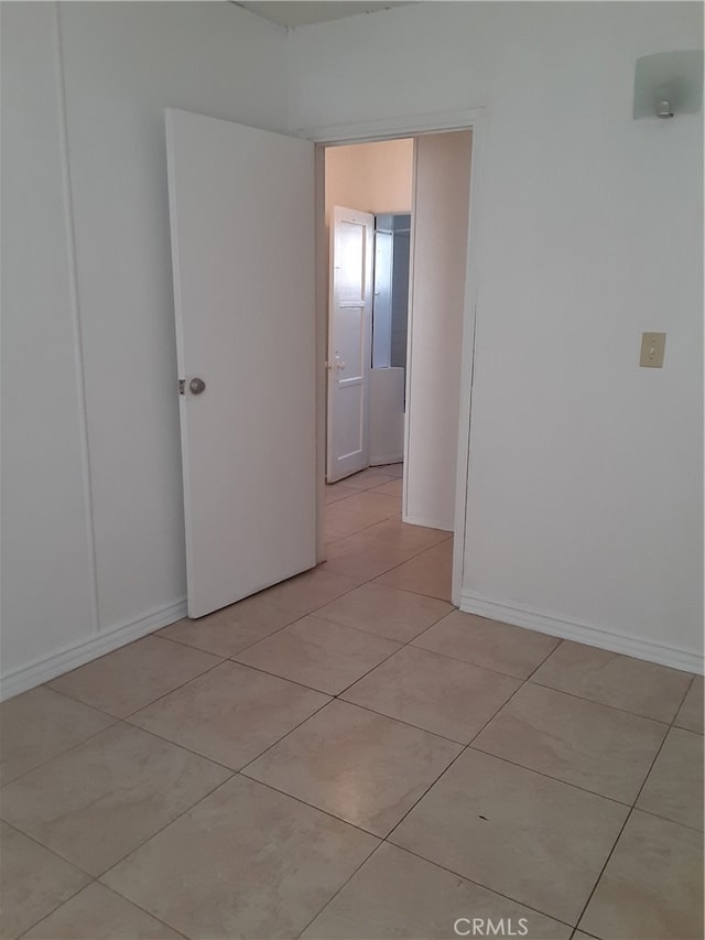 view of tiled spare room