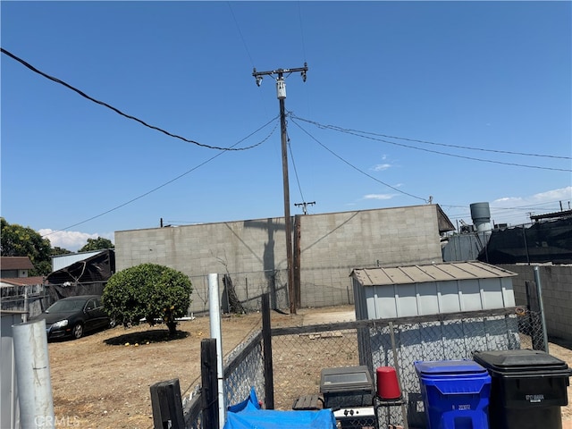 view of side of property with an outbuilding