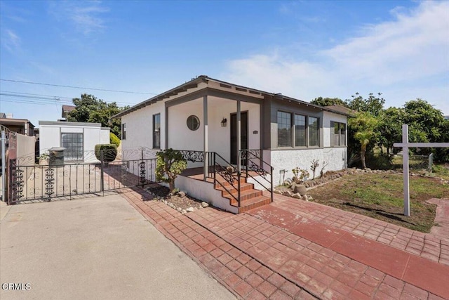 view of front of property featuring a patio