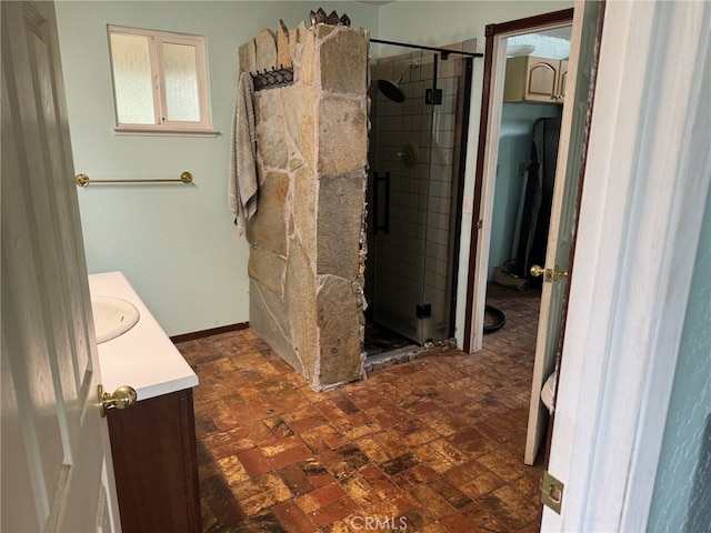 bathroom with vanity and walk in shower