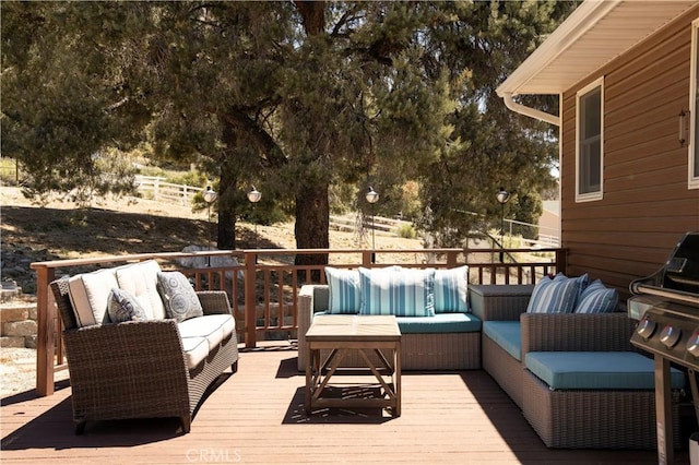 deck with an outdoor hangout area