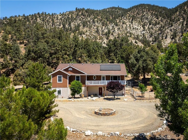 exterior space featuring a mountain view