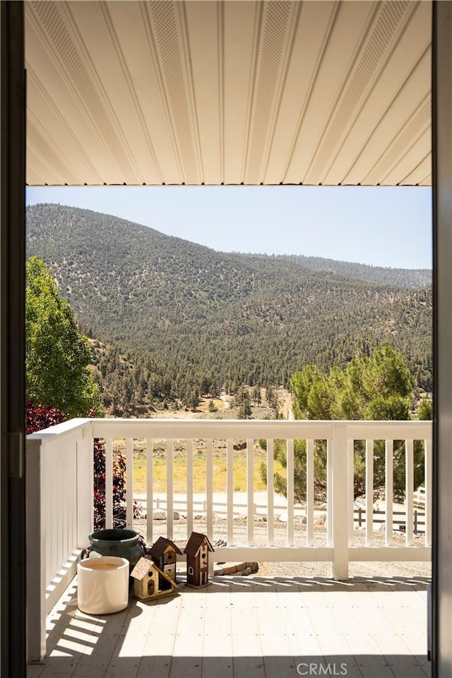 balcony featuring a mountain view