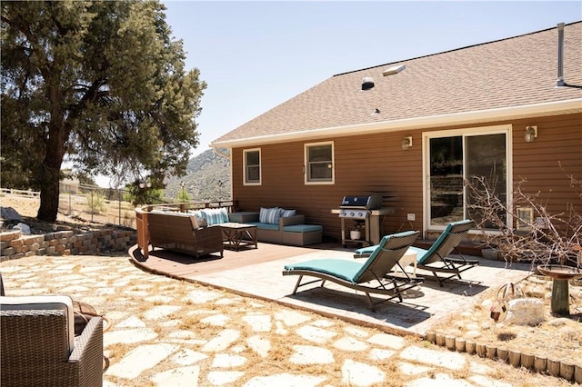 view of patio with a grill and an outdoor hangout area