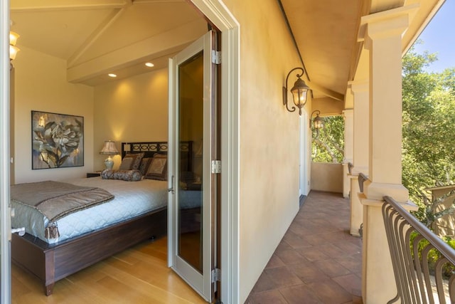 bedroom with lofted ceiling