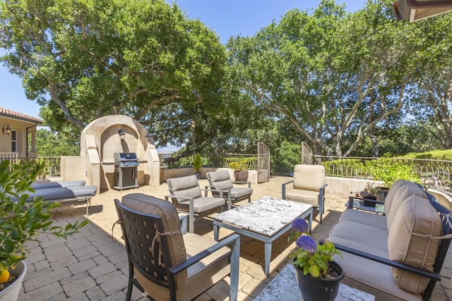 view of patio featuring grilling area and outdoor lounge area