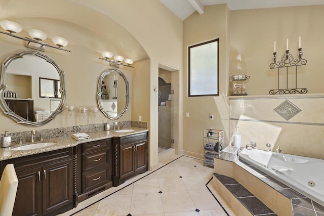 bathroom featuring vanity, separate shower and tub, and tile patterned floors