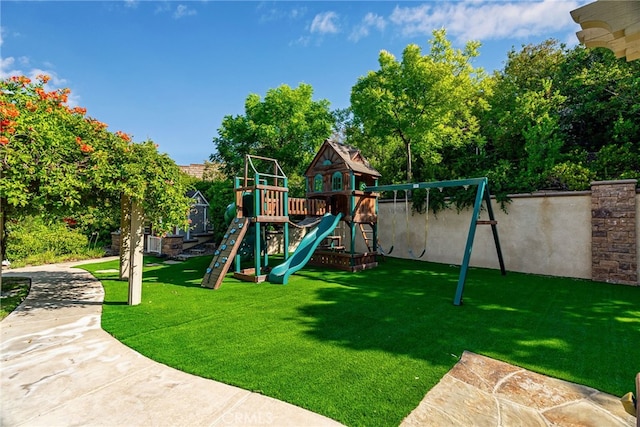 view of playground featuring a yard