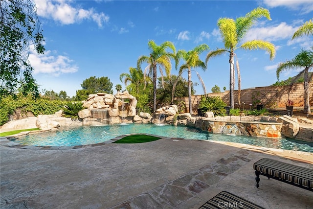 view of pool featuring a patio area and pool water feature