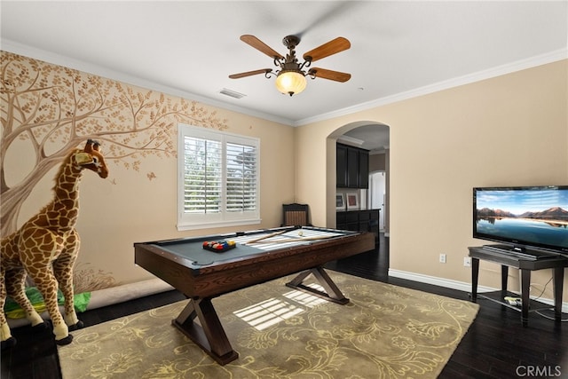 rec room with crown molding, dark hardwood / wood-style floors, billiards, and ceiling fan