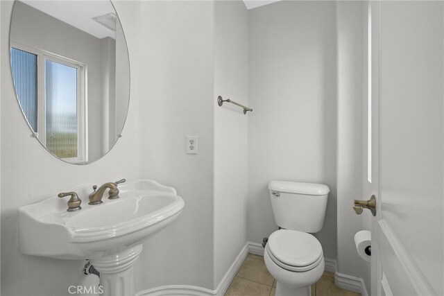 328 E Imperial Ave Unit 1, El Segundo, CA 90245 - bathroom featuring toilet, tile patterned floors, and baseboards