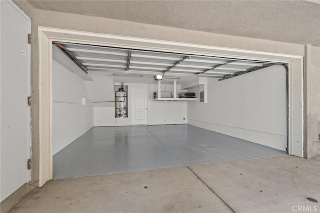 328 E Imperial Ave Unit 1, El Segundo, CA 90245 - garage featuring water heater and a garage door opener