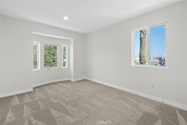 view of carpeted spare room