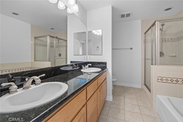 full bathroom with vanity, toilet, separate shower and tub, and tile patterned flooring