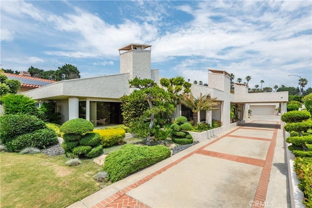 view of front of property with a garage