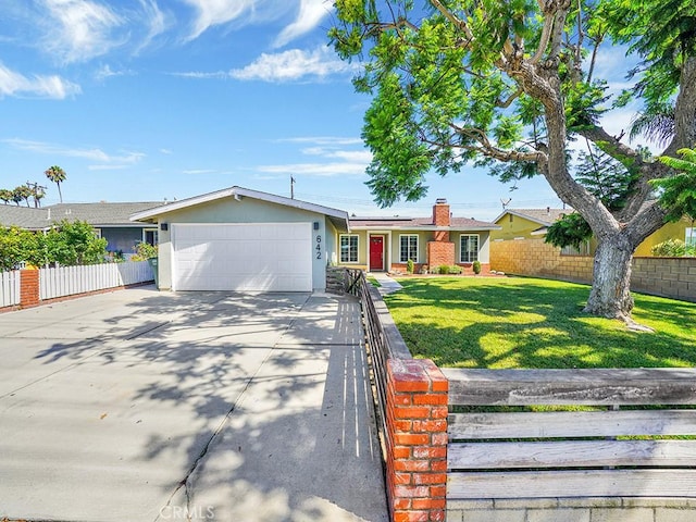 single story home featuring stucco siding, concrete driveway, fence, a garage, and a front lawn