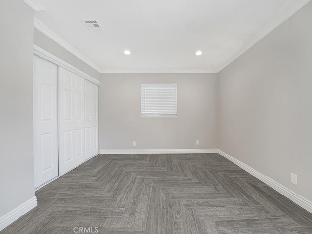 unfurnished bedroom featuring crown molding, recessed lighting, a closet, visible vents, and baseboards