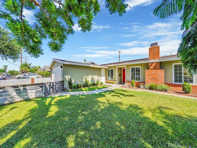 ranch-style home with brick siding, a chimney, stucco siding, fence, and a front lawn