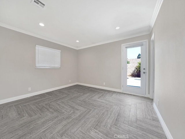 empty room featuring recessed lighting, visible vents, crown molding, and baseboards