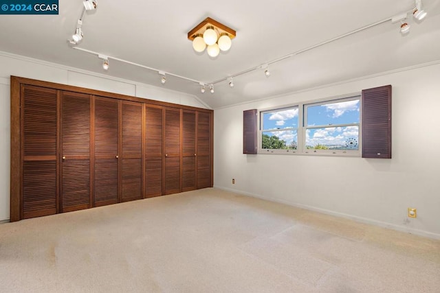 unfurnished bedroom featuring carpet flooring