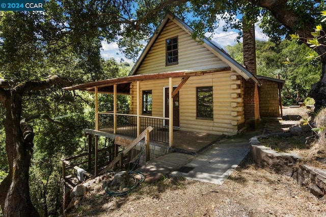 cabin with a porch