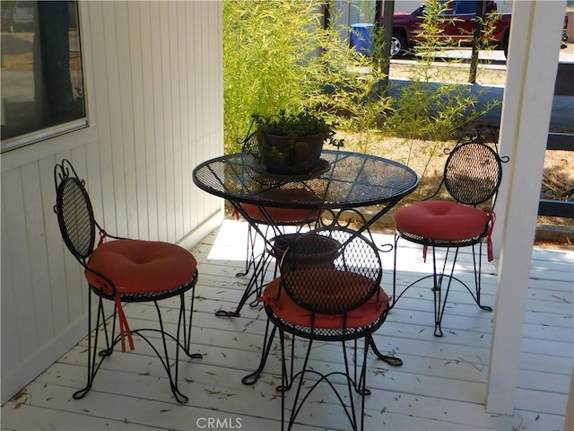 wooden balcony featuring a wooden deck