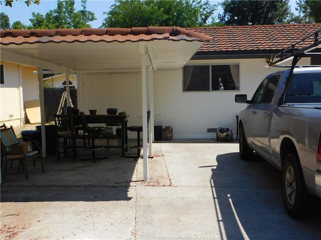 view of patio / terrace featuring a carport