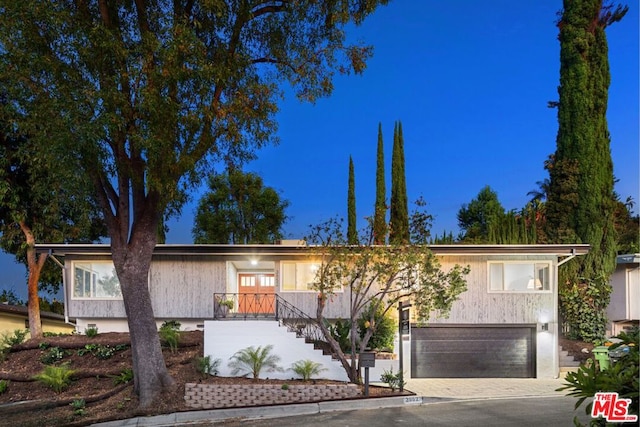 view of front of home with a garage