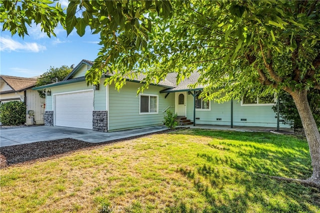 ranch-style home with a front yard and a garage