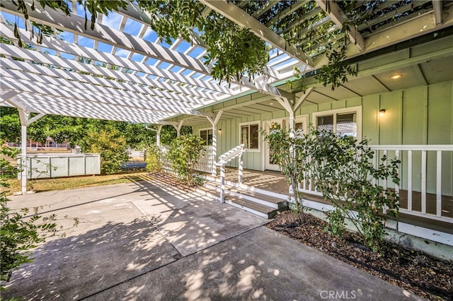 view of patio featuring a pergola