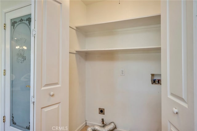 laundry area with hookup for a washing machine and electric dryer hookup