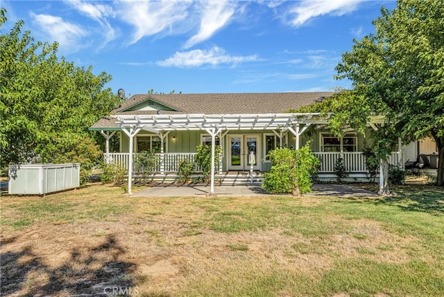 back of property featuring a lawn, a patio, a pool, and a pergola